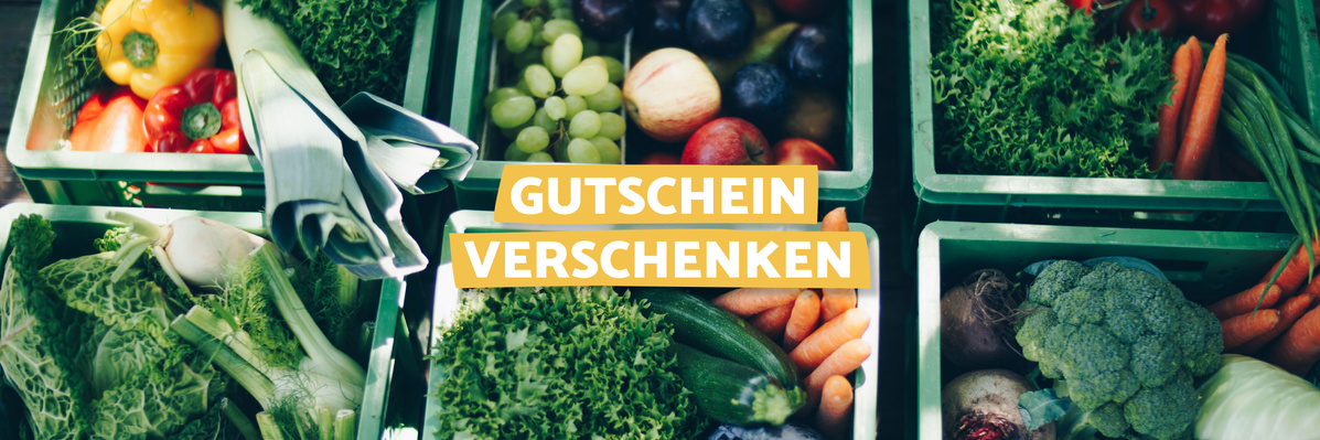 Obst und Gemüse in grünen Mehrweg-Ökokisten vom Boßhammersch Hof