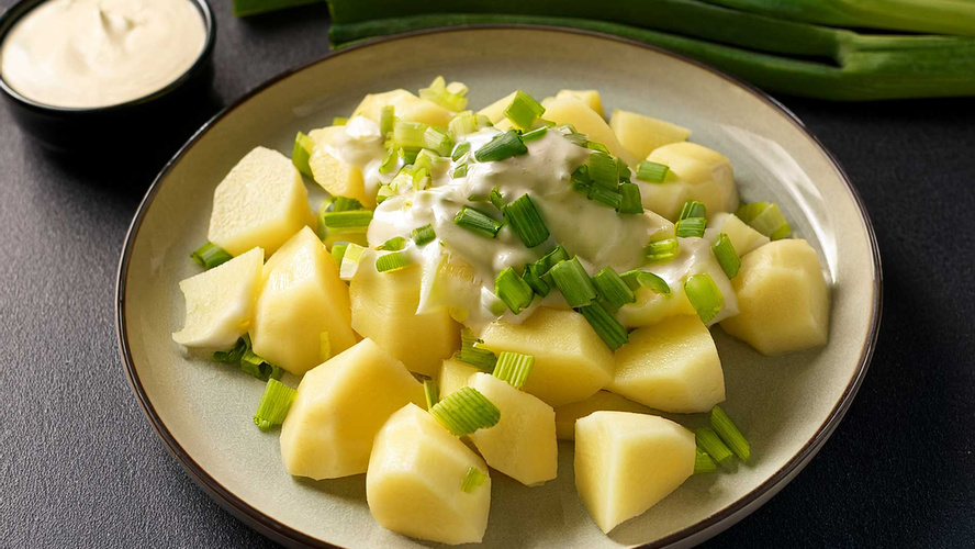 Rezeptbild für Schnelle Käsekartoffeln mit Sahne-Lauch